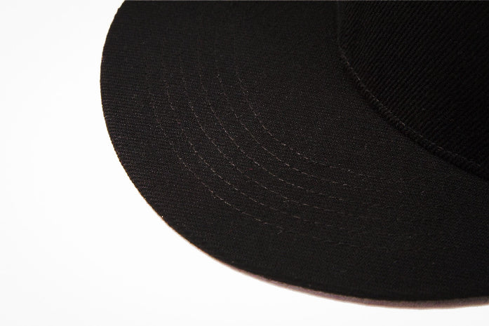 Black Baseball Hat - Brim Close Up View - The Cap Dudes